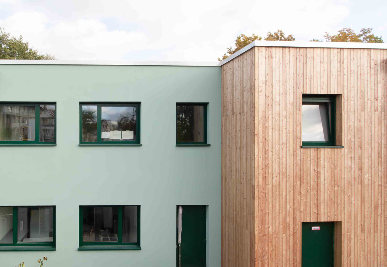 HENN_gruenes_Haus-zweifarbig