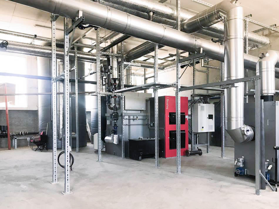 INFA-HEIZ_IMG_7103-950-1bearb-tyni Innenansicht des Heizhauses nach dem Umbau